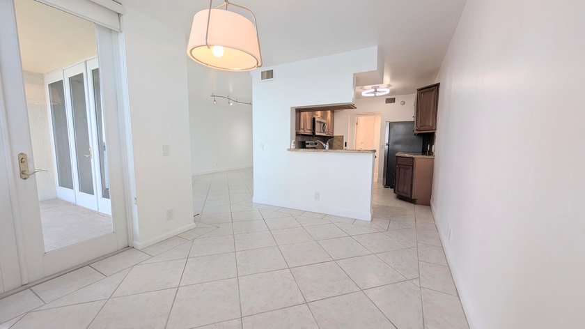 Enjoy beautiful lake views from this bright and inviting - photo 7