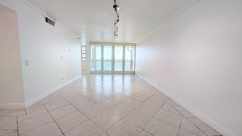 Enjoy beautiful lake views from this bright and inviting - photo 10