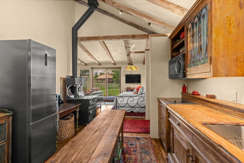 This exceptional 1.3-acre estate combines timeless architecture - photo 44