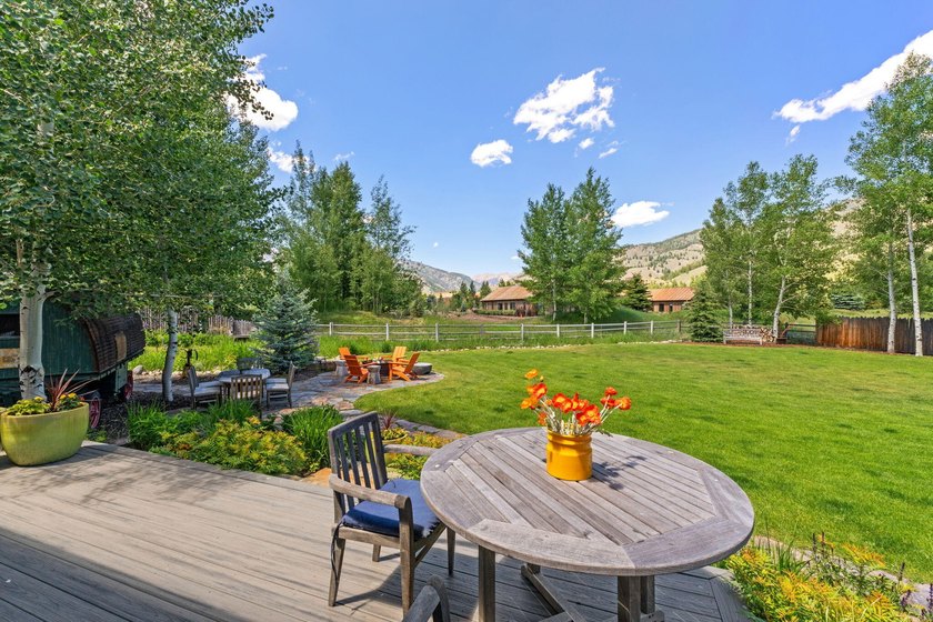 This exceptional 1.3-acre estate combines timeless architecture - photo 48