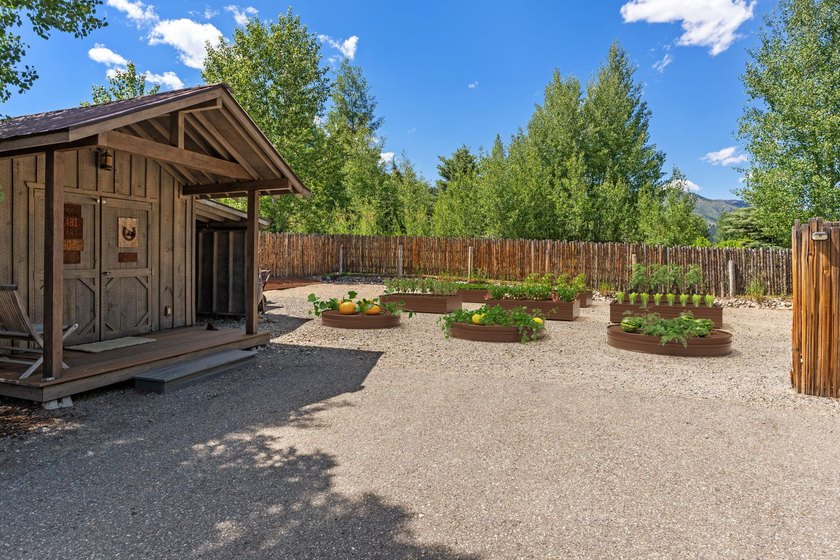 This exceptional 1.3-acre estate combines timeless architecture - photo 50