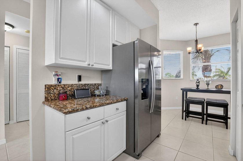 Stunning 2BR/2BA deluxe condo in the heart of SE Boca! Nestled - photo 15