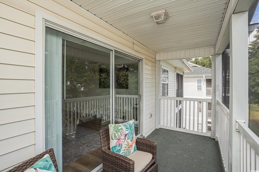 This top-floor remodeled, 1-bedroom, 1-bath condo offers a - photo 16
