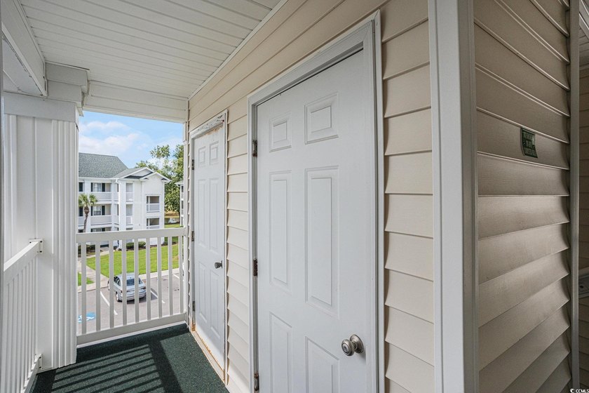 This top-floor remodeled, 1-bedroom, 1-bath condo offers a - photo 20