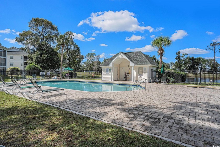 This top-floor remodeled, 1-bedroom, 1-bath condo offers a - photo 23