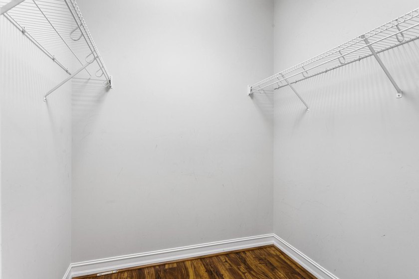 THIS FIRST FLOOR SPACIOUS LOW-MAINTENANCE COACH HOME FEATURES - photo 12