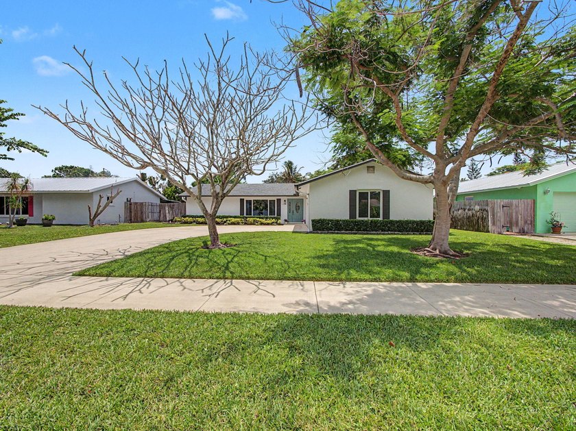 Nestled in the heart of the highly sought-after Village of - photo 3