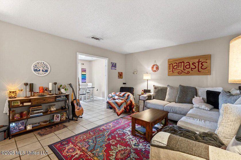 This 3-bedroom, 1.5-bathroom residence is the ideal addition to - photo 3