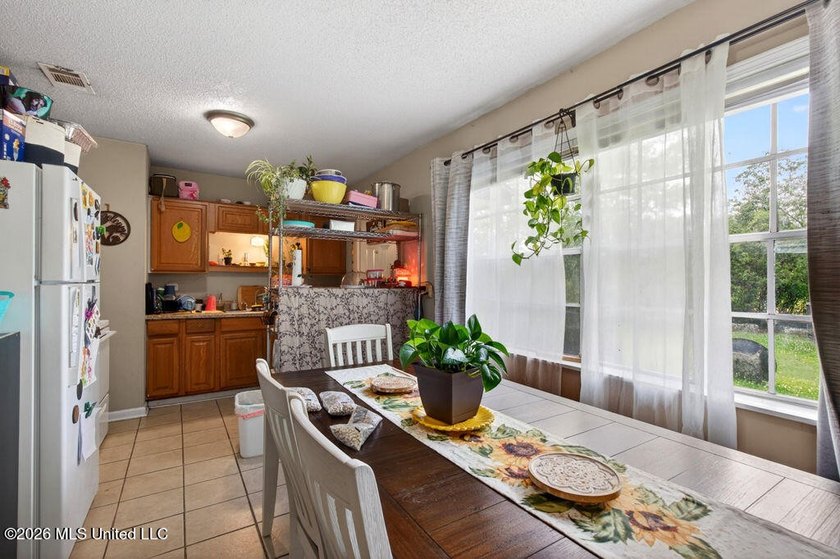 This 3-bedroom, 1.5-bathroom residence is the ideal addition to - photo 6