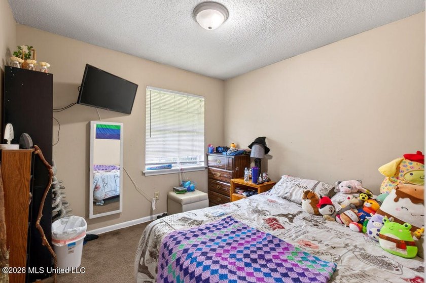 This 3-bedroom, 1.5-bathroom residence is the ideal addition to - photo 9