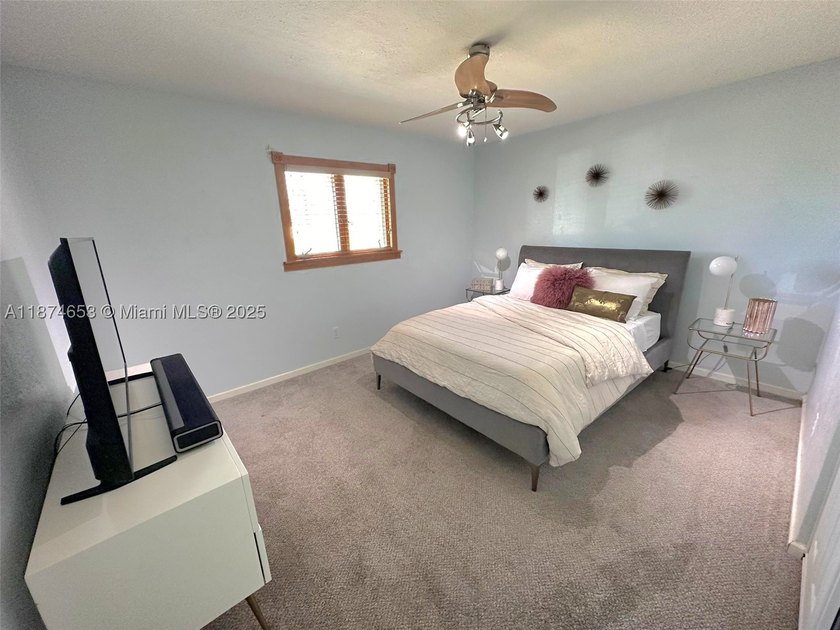 This inviting &amp; cozy 4-bedroom, 3-bathroom originally started as - photo 11