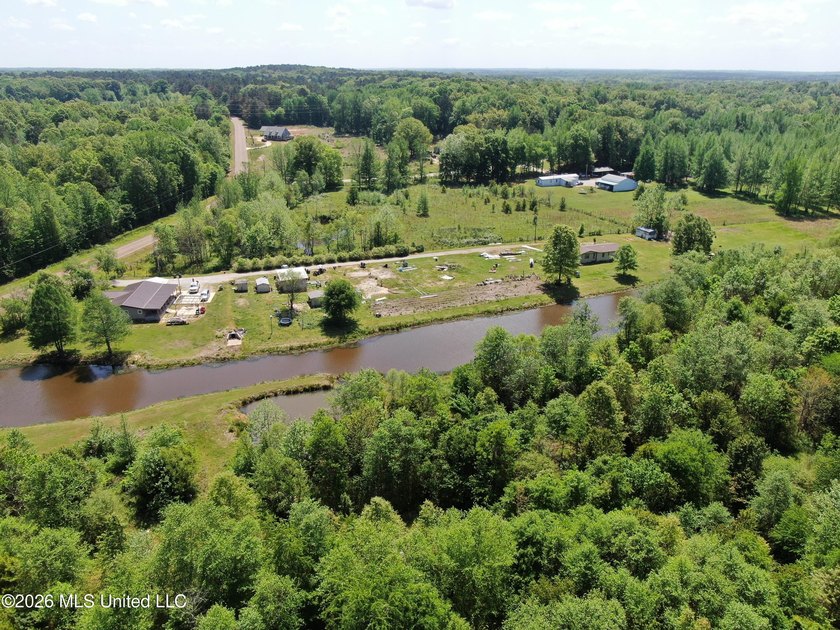 48 acres with a 3 BR 2 BA mobile home, shop, and additional home - photo 6