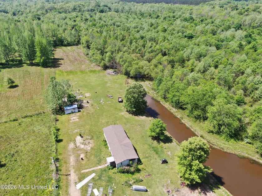 48 acres with a 3 BR 2 BA mobile home, shop, and additional home - photo 7