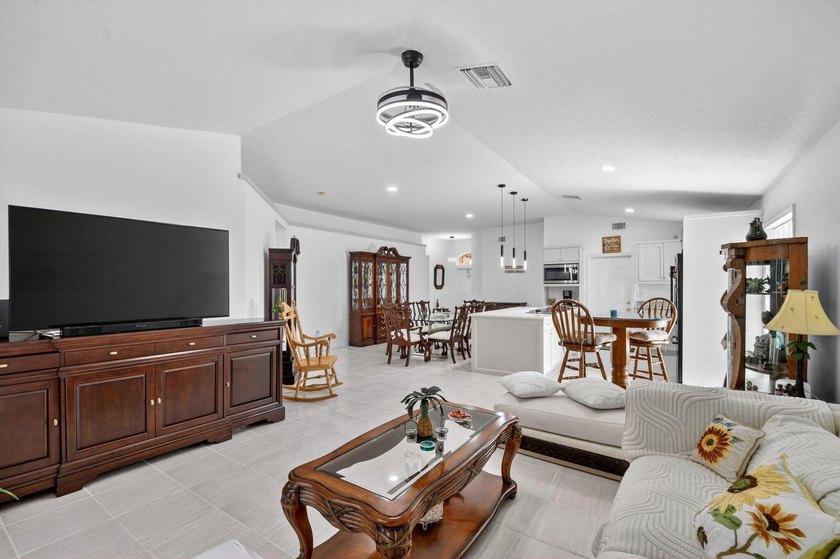WOW - Awesome pool home with renovated kitchen, flooring and - photo 17