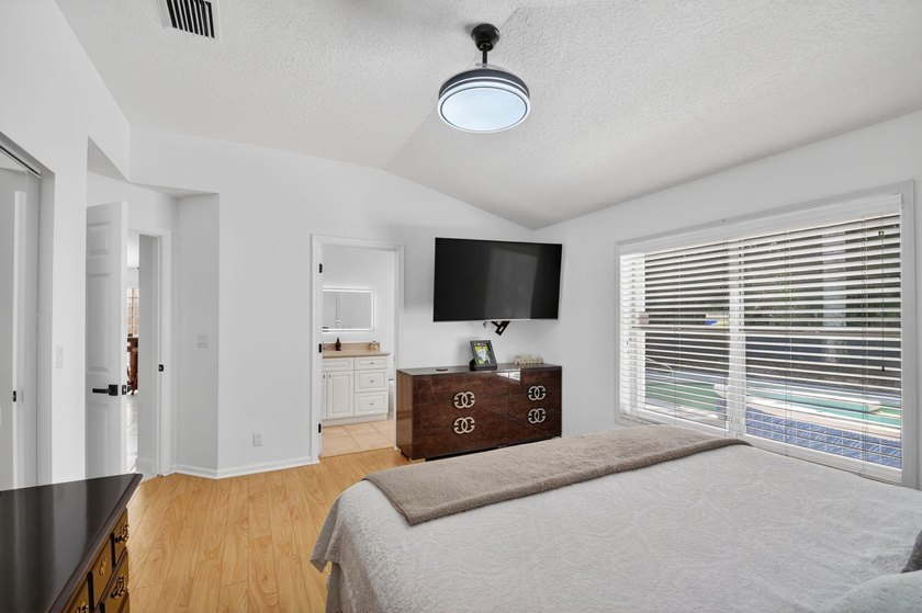 WOW - Awesome pool home with renovated kitchen, flooring and - photo 20