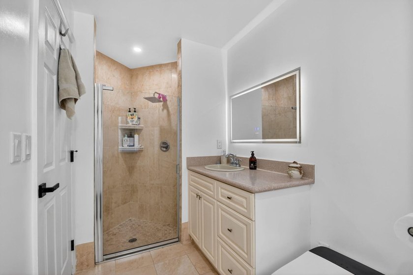 WOW - Awesome pool home with renovated kitchen, flooring and - photo 22