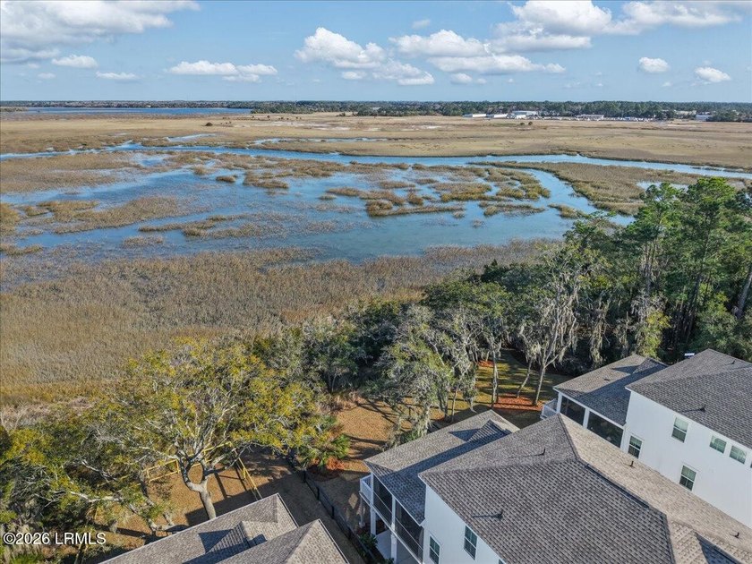 Luxury marsh front living, newer construction, deep water - photo 49