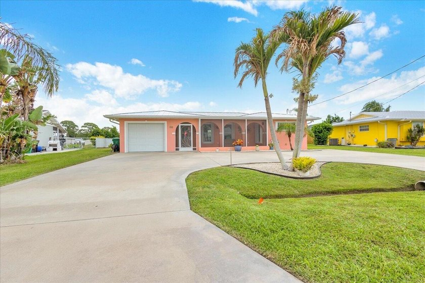 Beautifully maintained 3 BR, 2.5 BA waterfront home with 94' of - photo 2