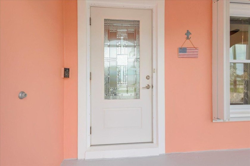 Beautifully maintained 3 BR, 2.5 BA waterfront home with 94' of - photo 7