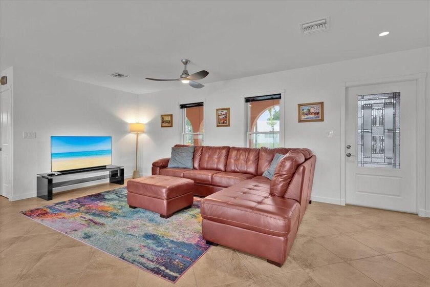 Beautifully maintained 3 BR, 2.5 BA waterfront home with 94' of - photo 9