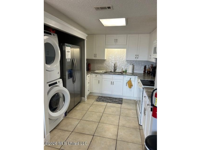 Investors dream. This unit has a signed 1 year lease with a - photo 9