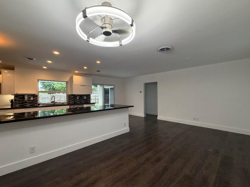**Move-in ready and new roof (2025)** Beautifully renovated - photo 2