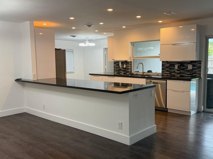 **Move-in ready and new roof (2025)** Beautifully renovated - photo 3