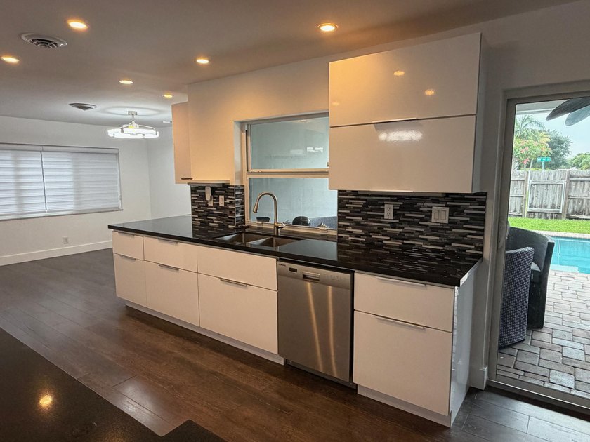 **Move-in ready and new roof (2025)** Beautifully renovated - photo 5