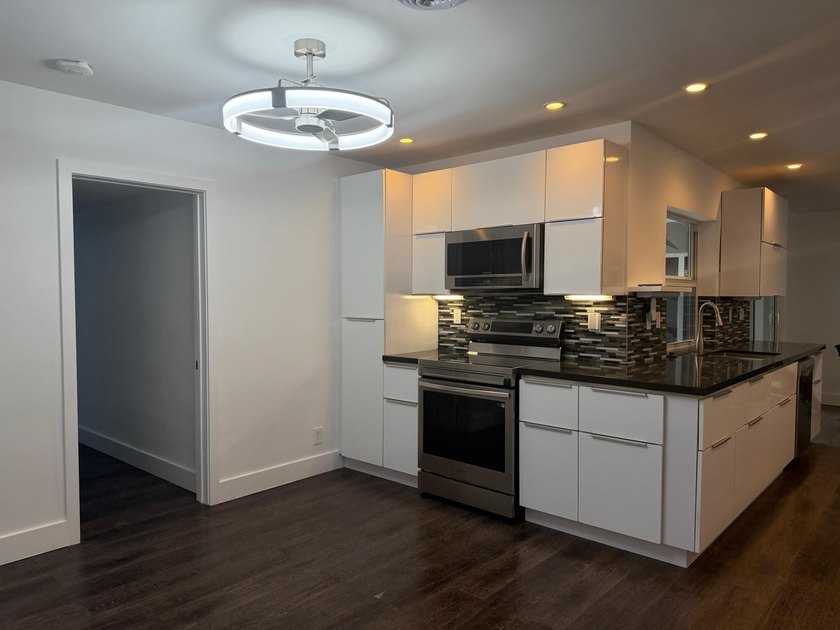 **Move-in ready and new roof (2025)** Beautifully renovated - photo 6