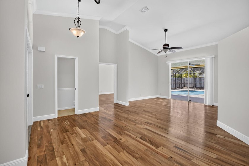 Live in one of Weston's premier gated communities, across from - photo 8