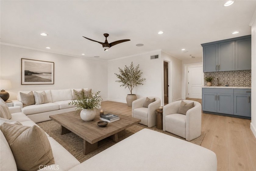 LOCATED JUST FOUR HOUSES FROM THE STRAND, this beautifully - photo 4