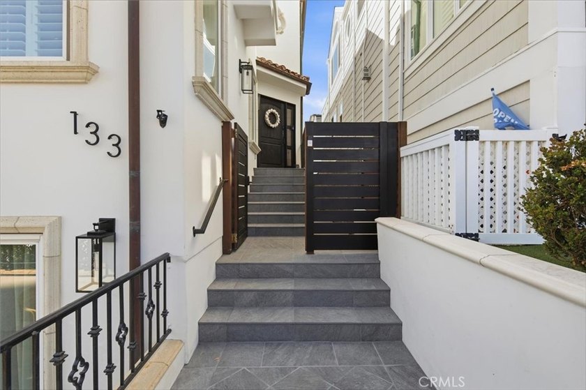 LOCATED JUST FOUR HOUSES FROM THE STRAND, this beautifully - photo 7