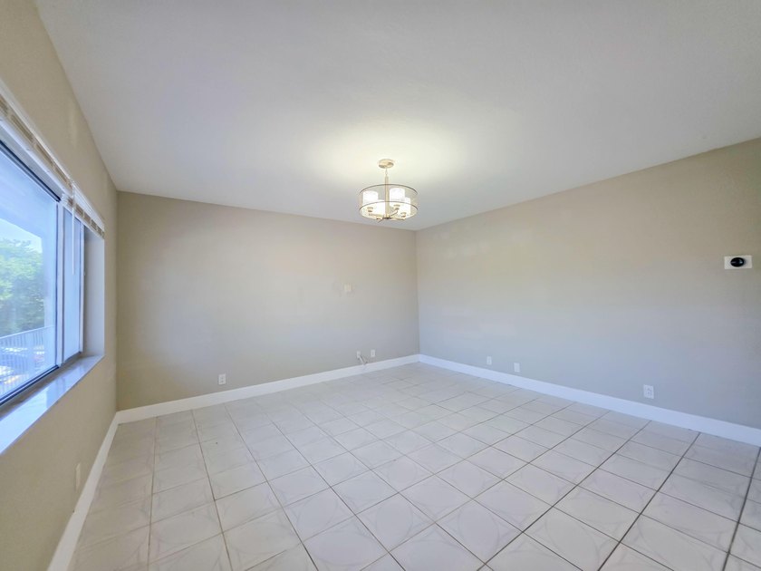 Welcome to this thoughtfully designed three-bedroom - photo 8
