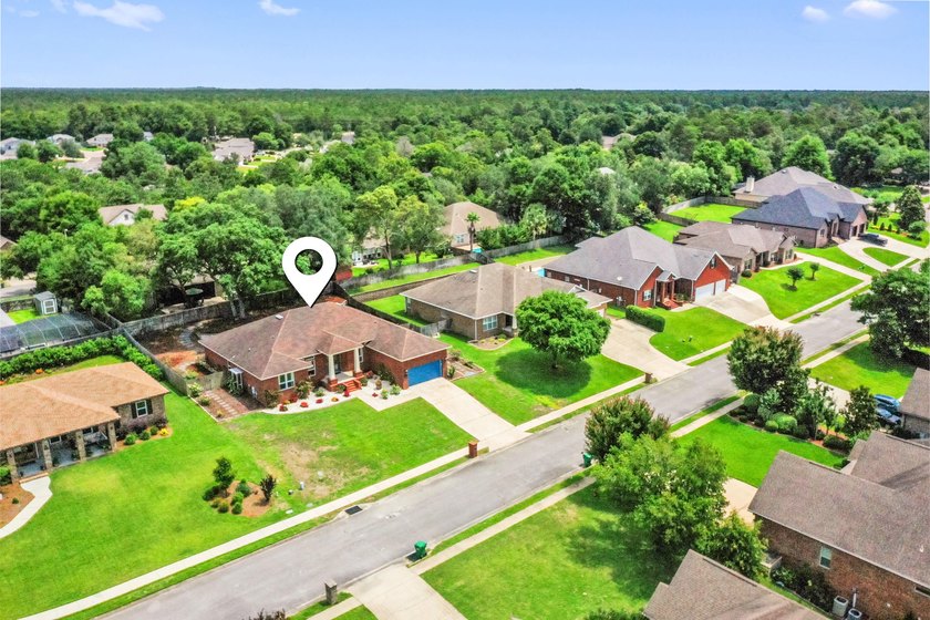 Before you reach the front door at 335 Grove Park Drive, the - photo 12