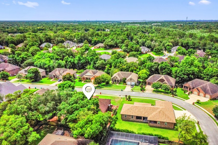 Before you reach the front door at 335 Grove Park Drive, the - photo 14