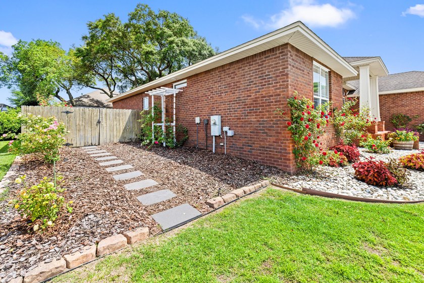 Before you reach the front door at 335 Grove Park Drive, the - photo 15
