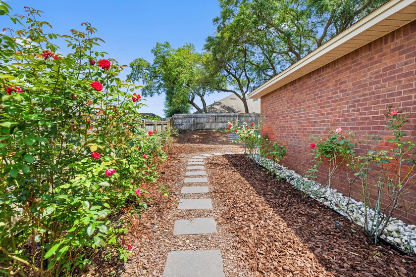 Before you reach the front door at 335 Grove Park Drive, the - photo 17