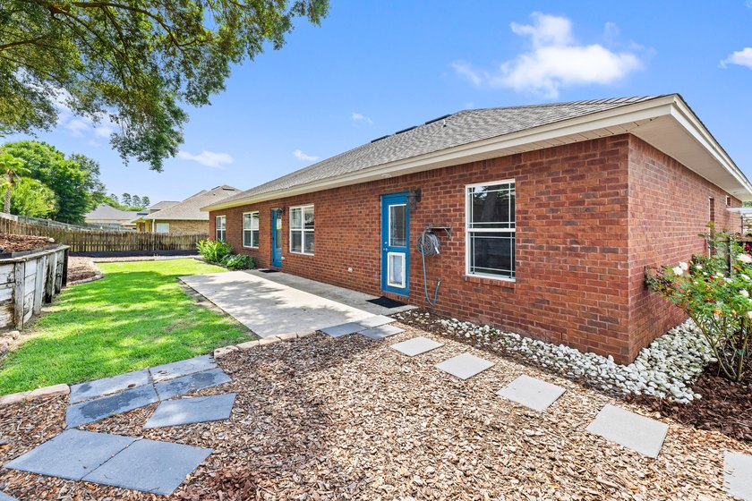 Before you reach the front door at 335 Grove Park Drive, the - photo 19