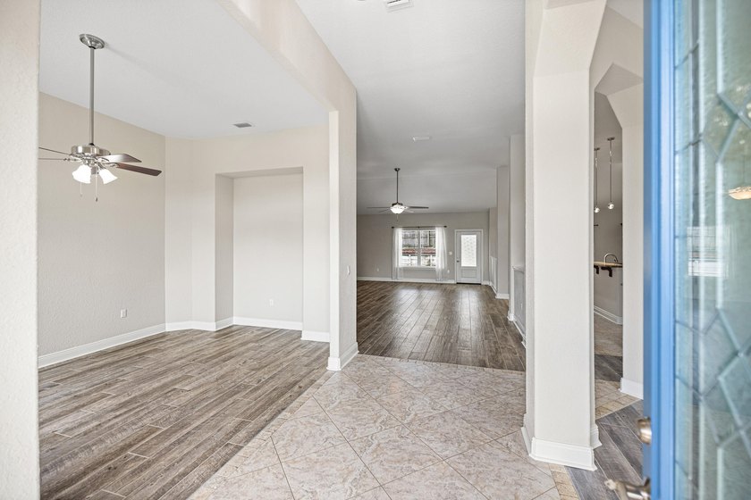 Before you reach the front door at 335 Grove Park Drive, the - photo 26