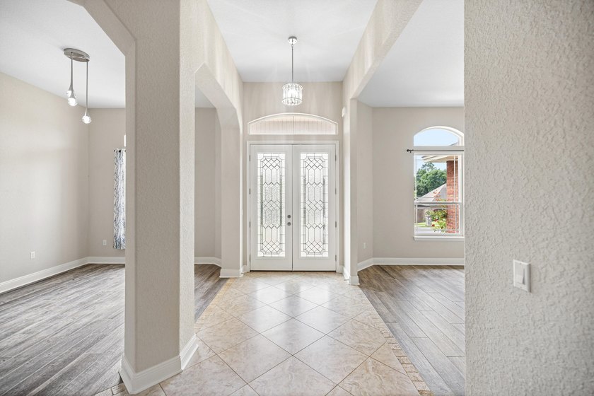 Before you reach the front door at 335 Grove Park Drive, the - photo 27