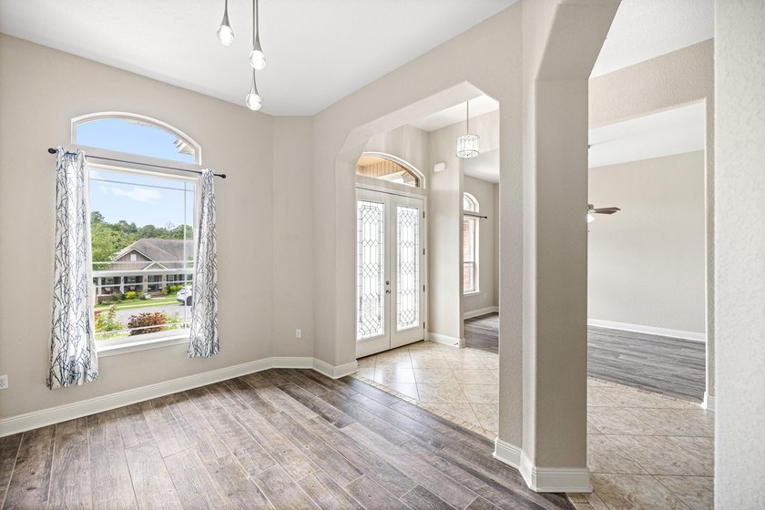 Before you reach the front door at 335 Grove Park Drive, the - photo 28