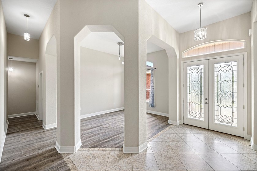 Before you reach the front door at 335 Grove Park Drive, the - photo 34