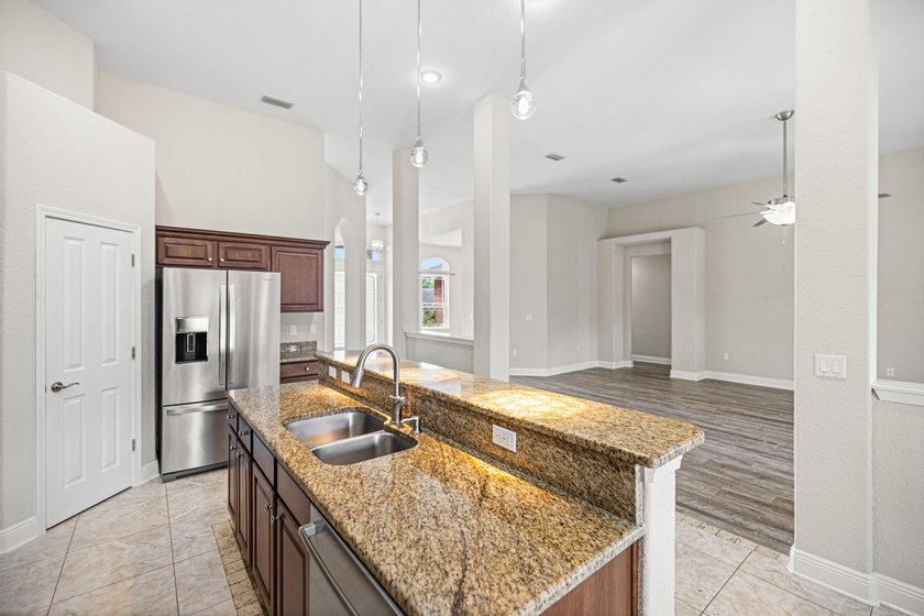Before you reach the front door at 335 Grove Park Drive, the - photo 41