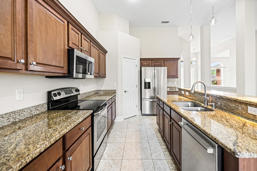 Before you reach the front door at 335 Grove Park Drive, the - photo 43