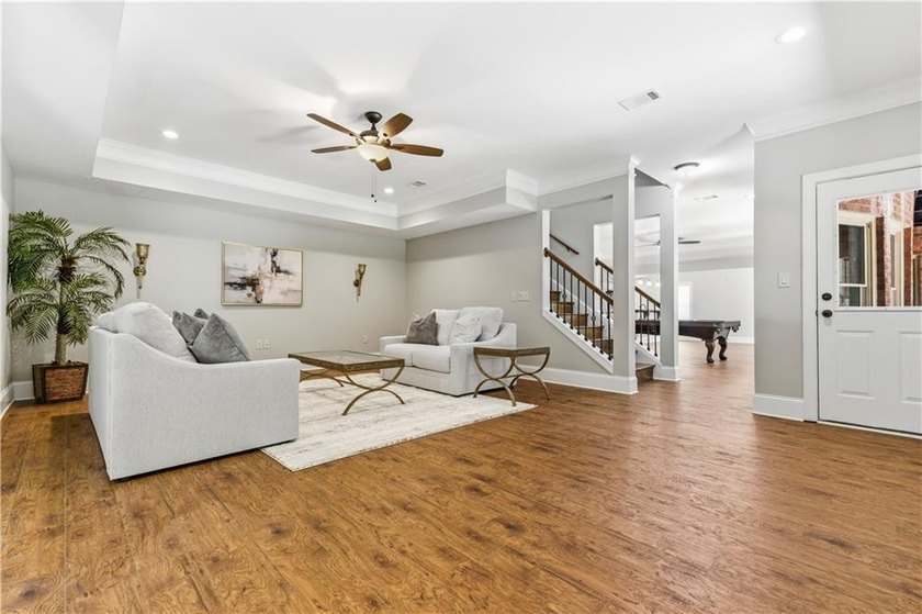 FOUR car garage! Primary suite options on both the main and - photo 44