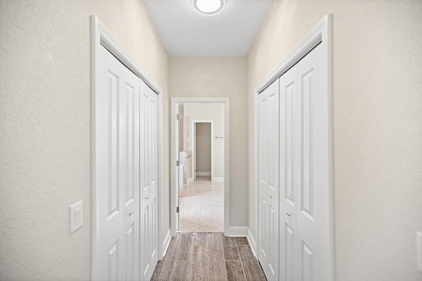 Before you reach the front door at 335 Grove Park Drive, the - photo 48