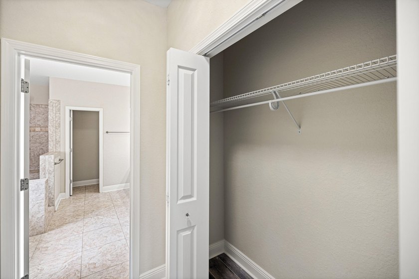 Before you reach the front door at 335 Grove Park Drive, the - photo 50