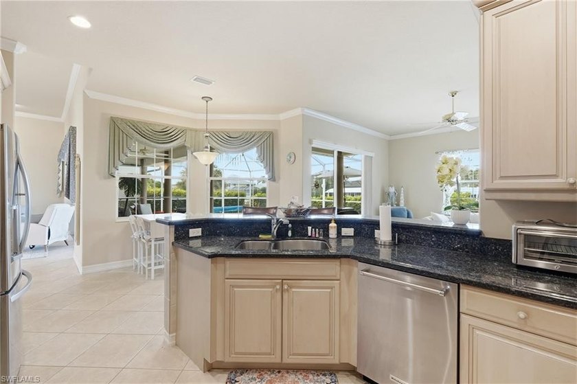 Enjoy coveted southern exposure and quick boating access to the - photo 19