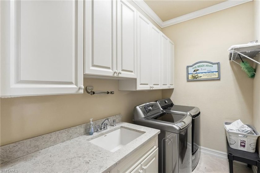 Enjoy coveted southern exposure and quick boating access to the - photo 31