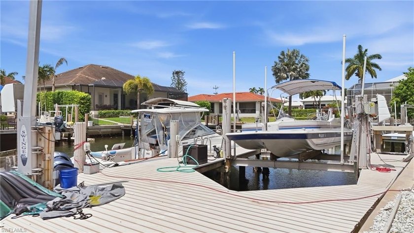 Enjoy coveted southern exposure and quick boating access to the - photo 37